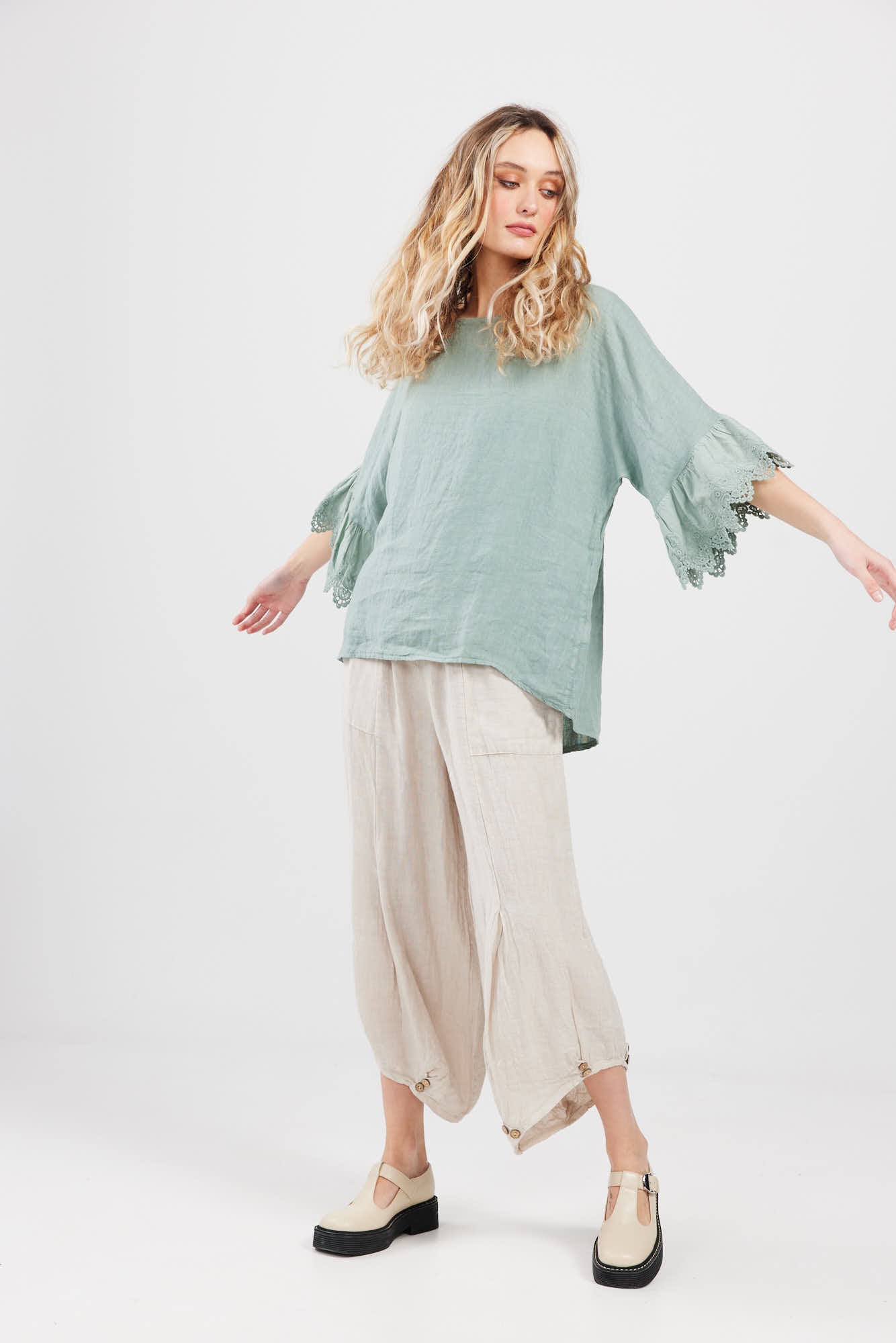 Ellie lace ruffled sleeve top.  Pale French Green