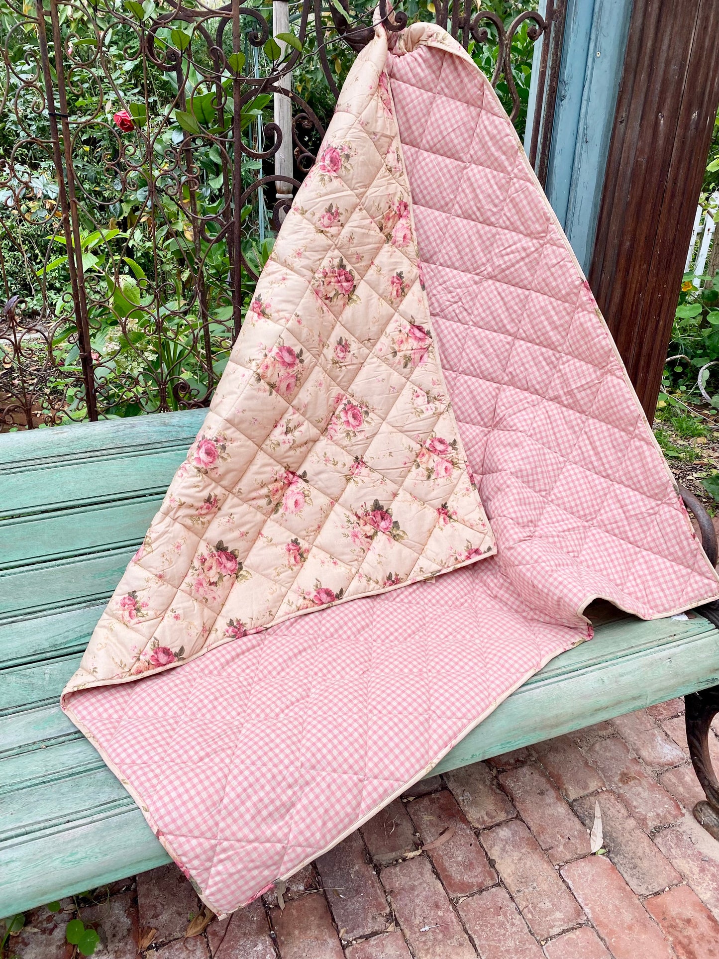 Garden Party quilted Throw . Petite Fleur print with vintage pink check reversible back